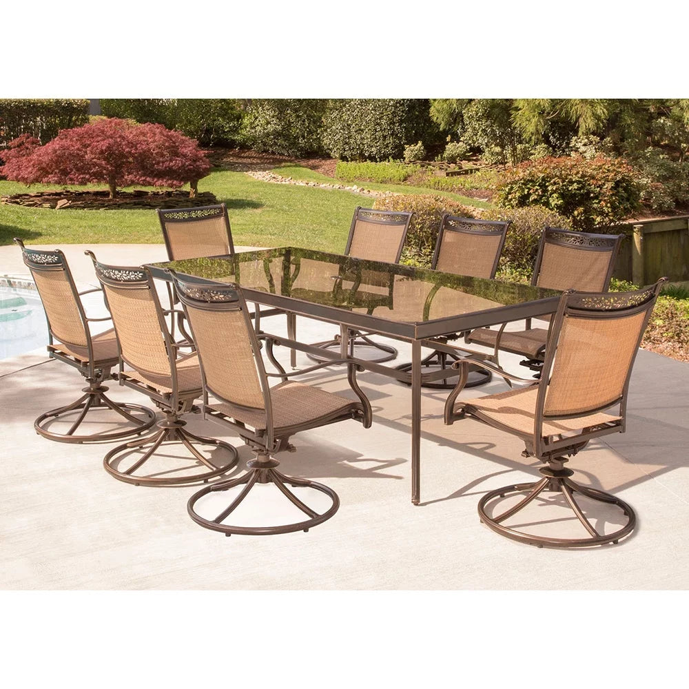 9-Piece Outdoor Dining Set with Swivel Rockers and Glass-Top Table O975