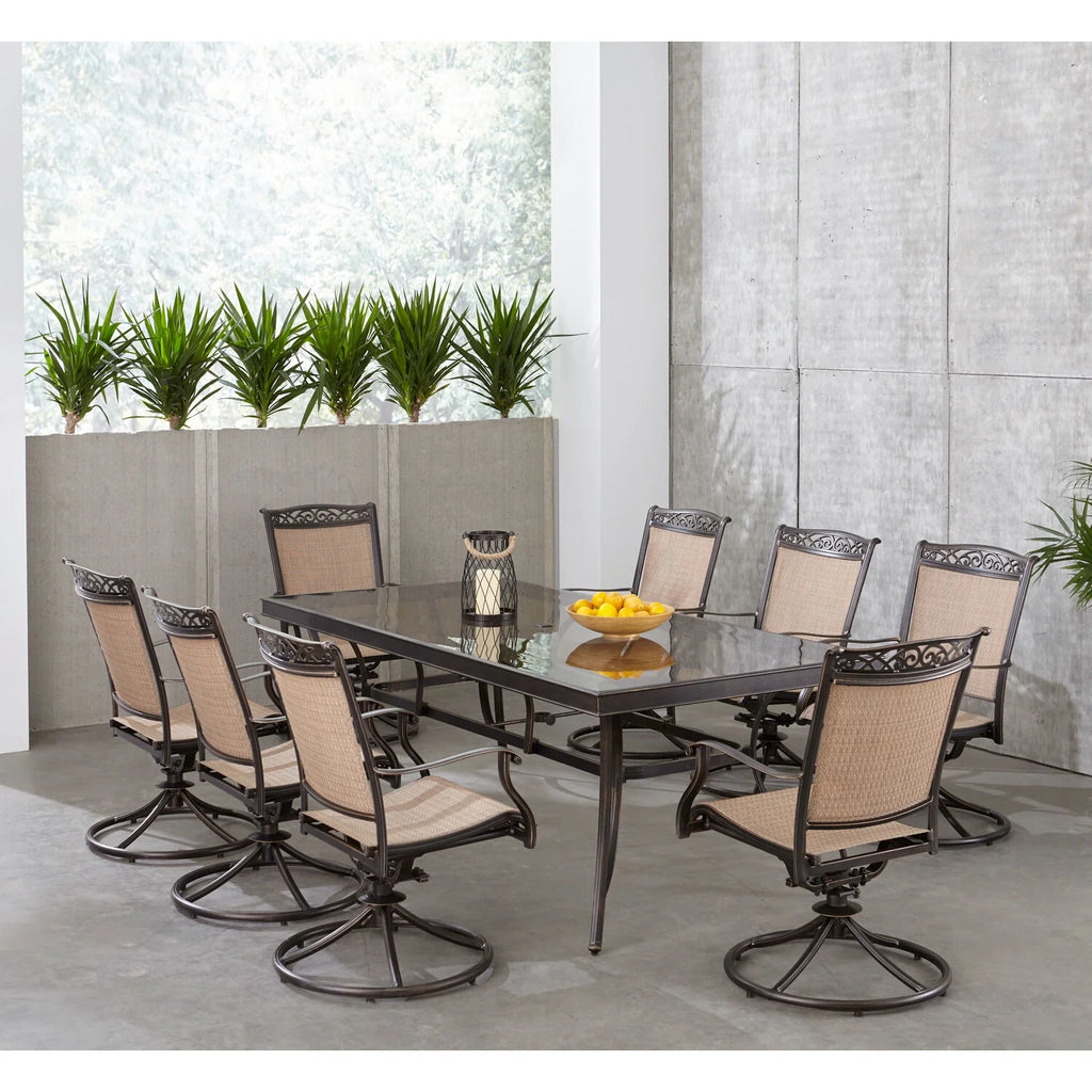 9-Piece Outdoor Dining Set with Swivel Rockers and Glass-Top Table O975