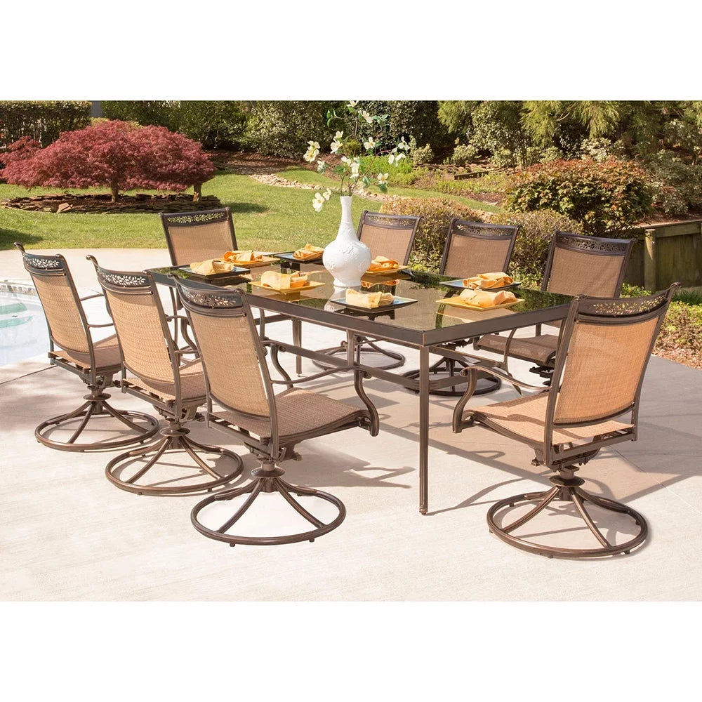 9-Piece Outdoor Dining Set with Swivel Rockers and Glass-Top Table O975